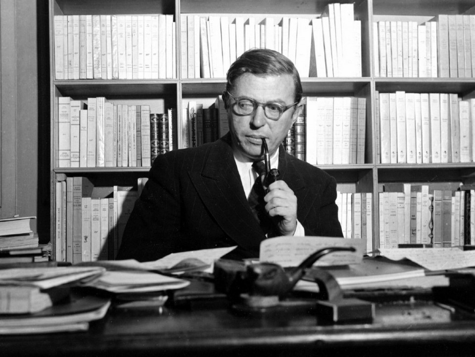 W ** --- ** FILE ** French playwright and philosopher Jean-Paul Sartre is shown in his study in Paris, on November 28, 1948. (AP Photo) ** B