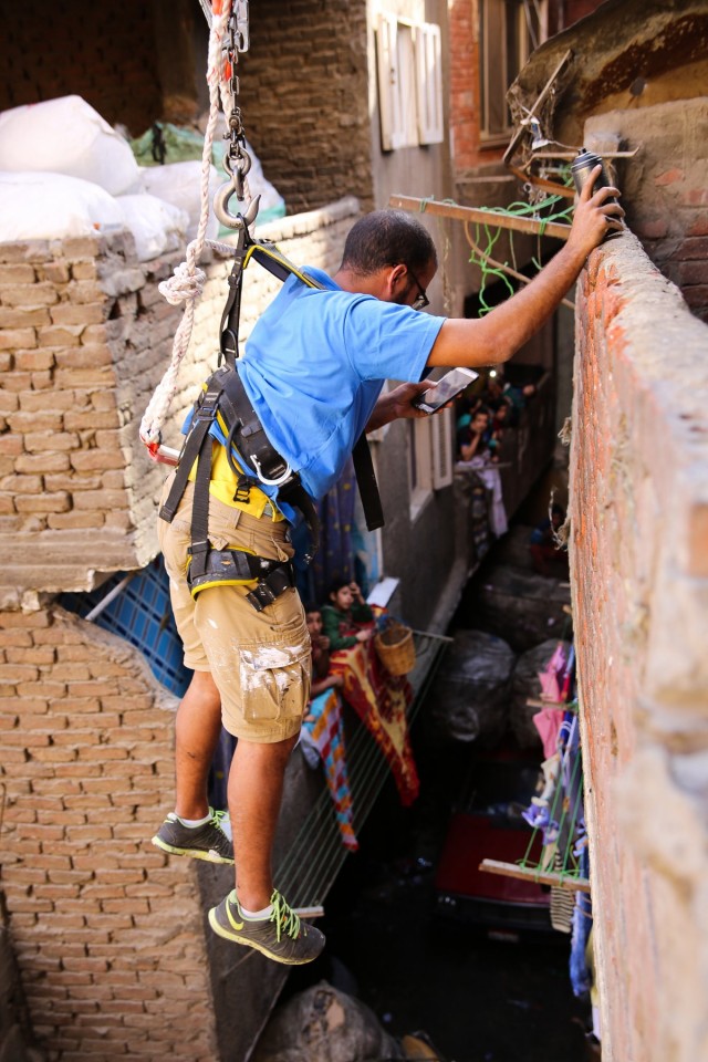 every-time-we-go-to-a-new-building-we-dont-know-what-to-expect-he-says-you-reach-for-one-ledge-and-someone-offers-you-some-tea-and-food-its-always-a-positive-attitude-and-thats-what-we-tried-to-absorb