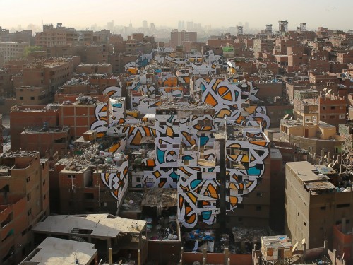 Ένα εντυπωσιακό mural που απλώνεται σε 50 κτίρια, έφτιαξε καλλιτέχνης στο Κάιρο