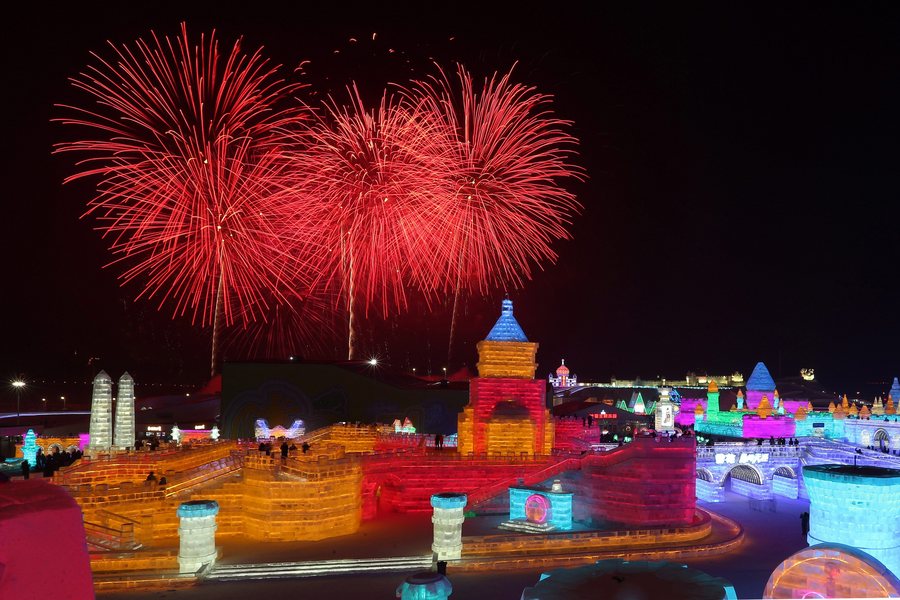 epa05699198 Fireworks display over the ice sculptures at the 33rd Harbin International Ice and Snow Festival in Harbin city, China's northern Heilongjiang province, 05 January 2017. Some 180,000 cubic meters of ice and 150,000 cubic meters of snow were used to build the 800,000-square-meter Harbin ice and snow world where the festival will last for about three months.  EPA/WU HONG