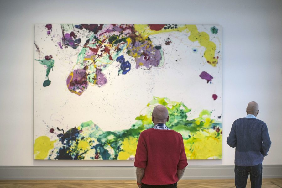 epa05730963 Men look at a painting by US artist Sam Francis at the Barberini Museum in Potsdam, Germany, 19 January 2017. After several years of construction, the museum built on the site of the Barberini Palace in the Old Market Square will open this week exhibiting pieces of the museum's patron Hasso Plattner's collection as well as special exhibitions ranging from the Old Masters to contemporary art with a focus on impressionism.  EPA/OLIVER WEIKEN
