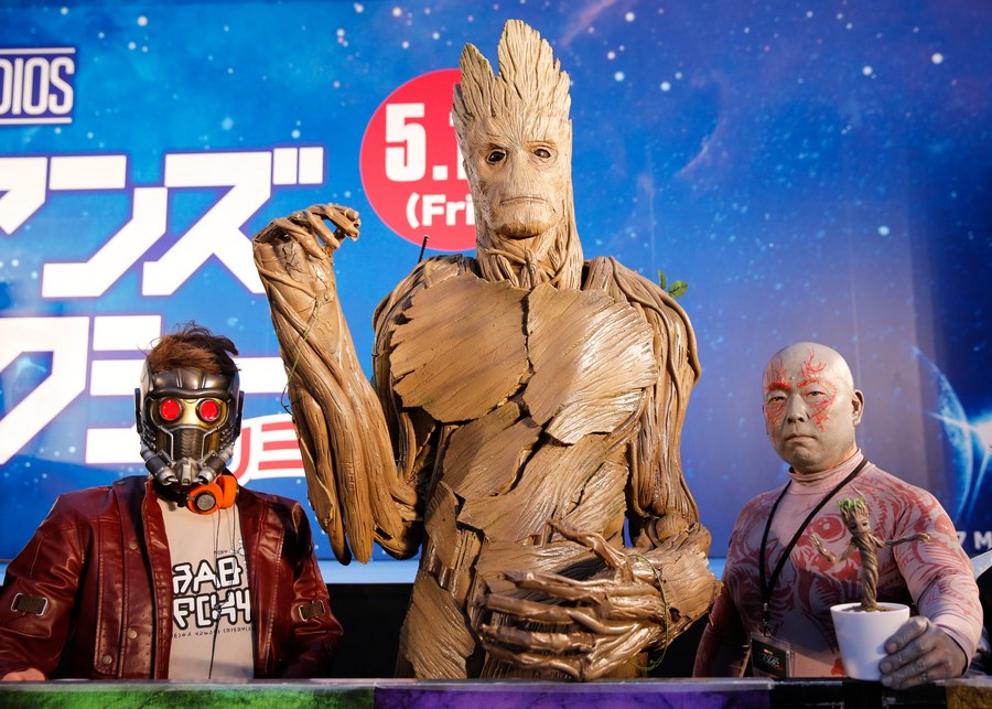 epa05901241 Fans wearing costumes attend the premiere of 'Guardians of the Galaxy Vol. 2' in Tokyo, Japan, 10 April 2017. The action science fiction movie will be screened across Japan from 12 May on.  EPA/CHRISTOPHER JUE