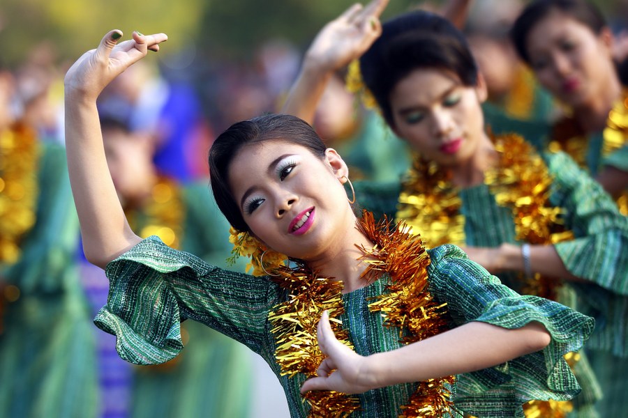 epa05906020 Myanmar traditional dancers perform during the opening ceremony of the Thingyan Water Festival in Naypyitaw, Myanmar, 13 April 2017. The annual water festival, known as Thingyan, features large groups of people congregating to celebrate the by splashing water and throwing powder at each other's faces as a symbol of cleansing and washing away the sins from the old year, and to mark the traditional New Year in countries such as Myanmar, Thailand, Laos and Cambodia. This year, the Myanmar Thingyan water festival runs from 13 to 16 April.  EPA/HEIN HTET