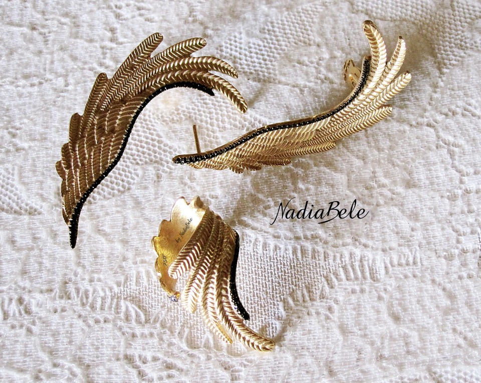 φτερά σκουλ+δαχτυλ