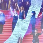 Στο Φεστιβάλ των Καννών, ύψωσαν πανό με τα ονόματα γυναικών που δολοφονήθηκαν